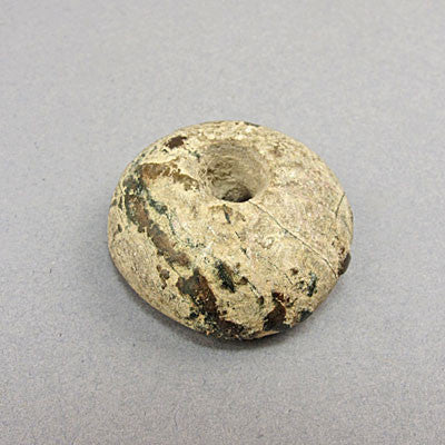 Ancient artifact old glass bead