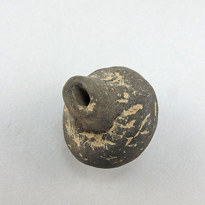 Ancient artifact sao clay bead