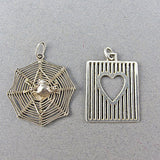 2 vintage silver pendants