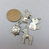 4 Vintage silver  jewellery charms