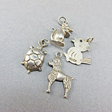 4 Vintage silver jewellery  charms