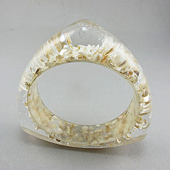 Vintage lucite bangle snow flakes